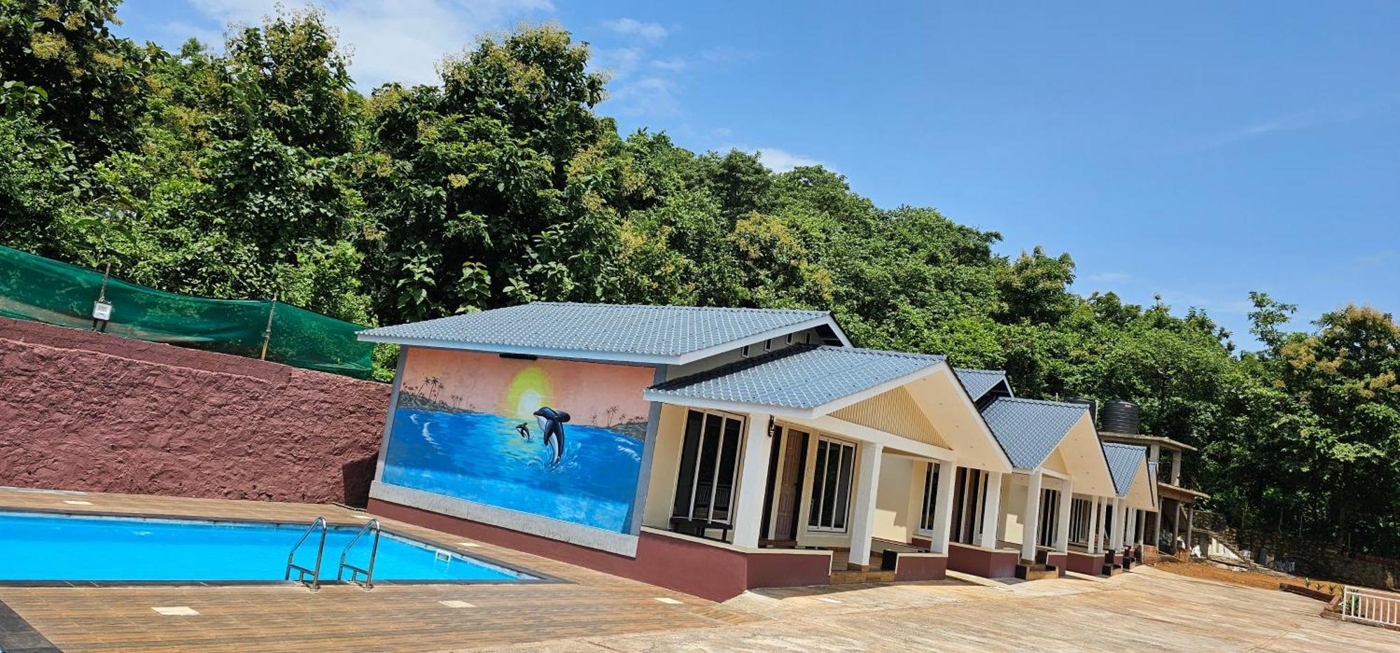 Nisarg Resort Guhāgar Buitenkant foto